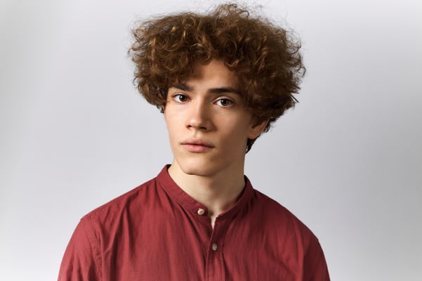 Tapered Sides with Defined Curls for Curly Hair Men