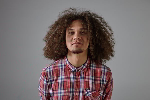 The Classic Afro Haircut for Curly Hair Guy