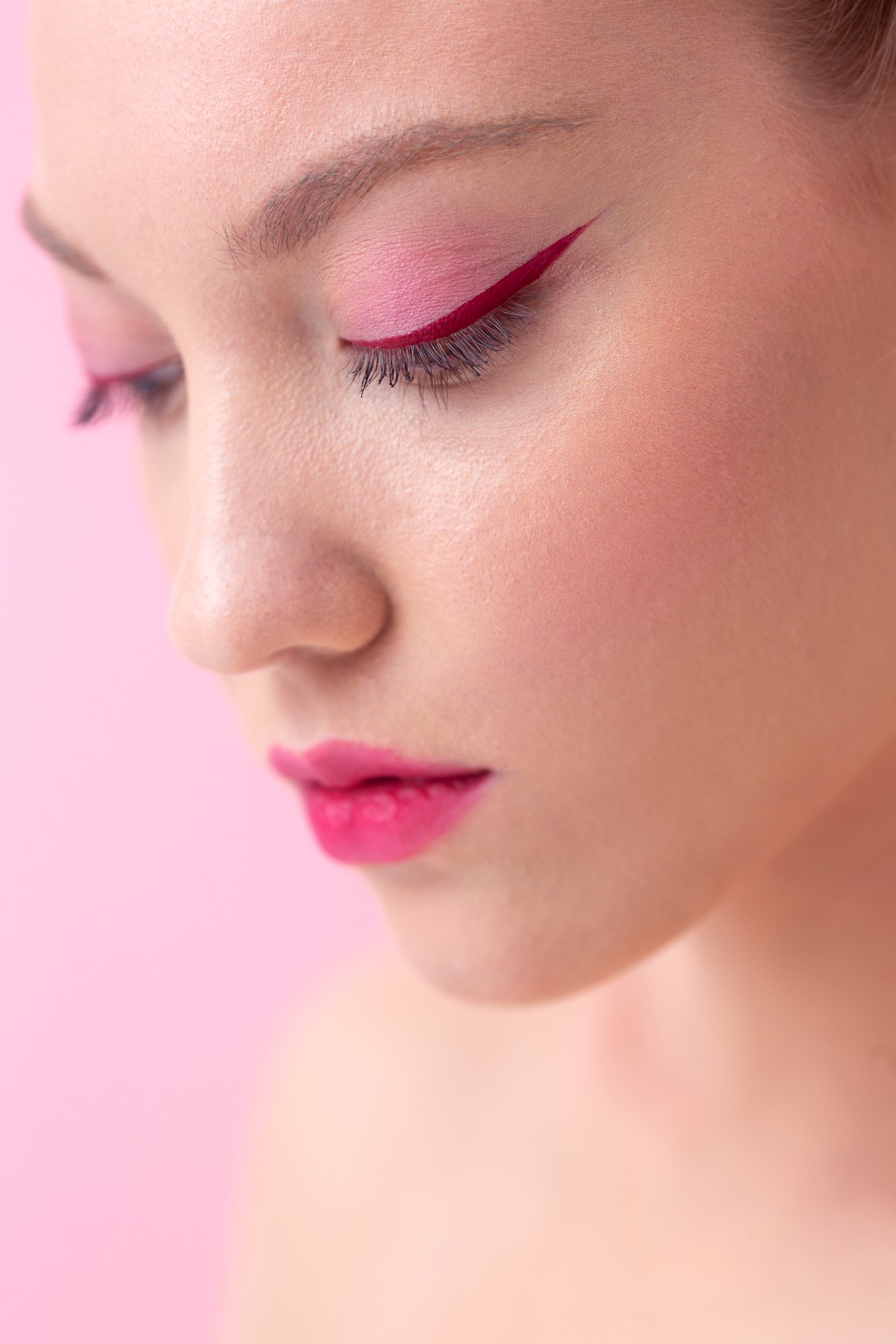 beautiful-woman-wearing-pink-makeup-close-up (1)