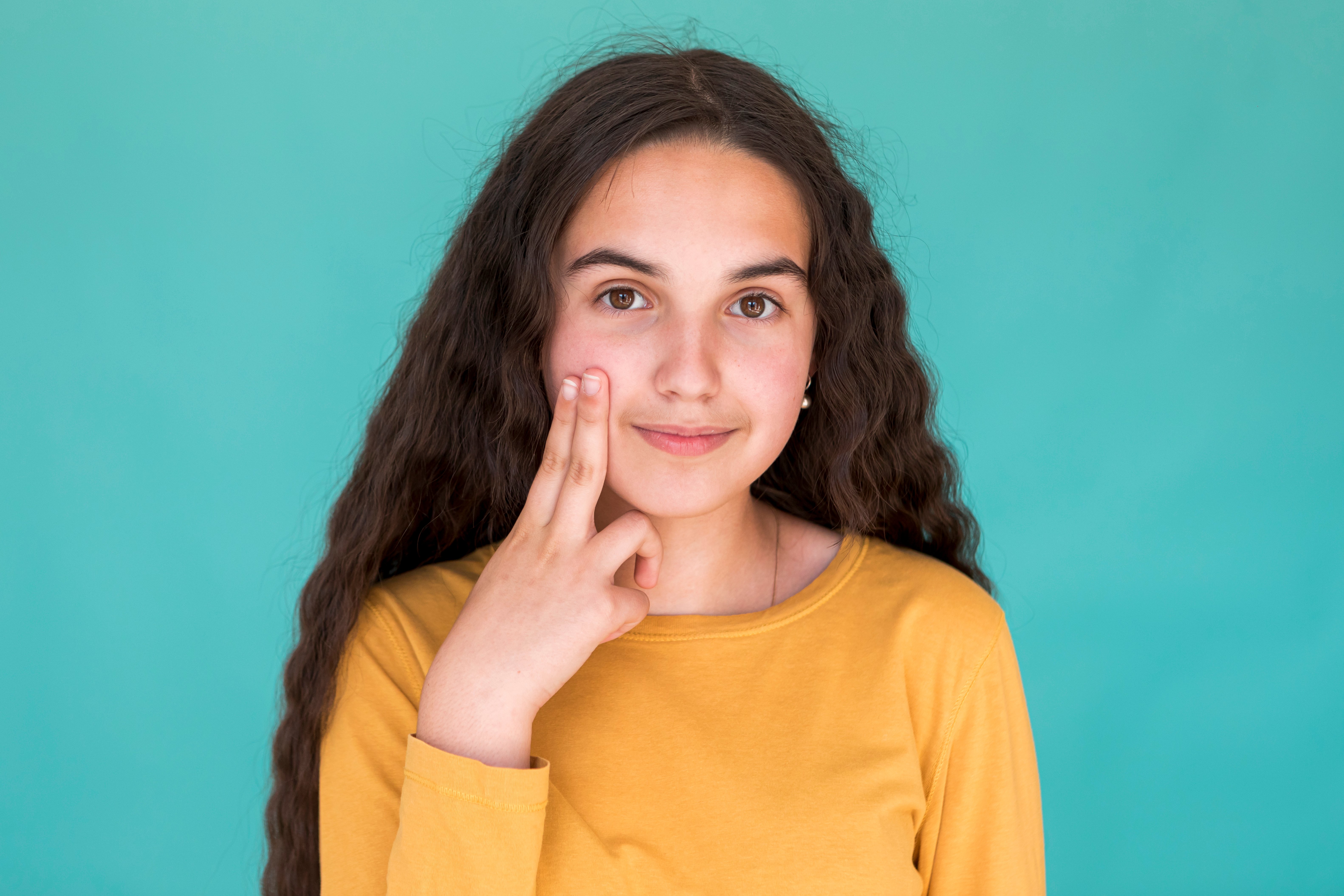 little-girl-smiling-while-looking-camera