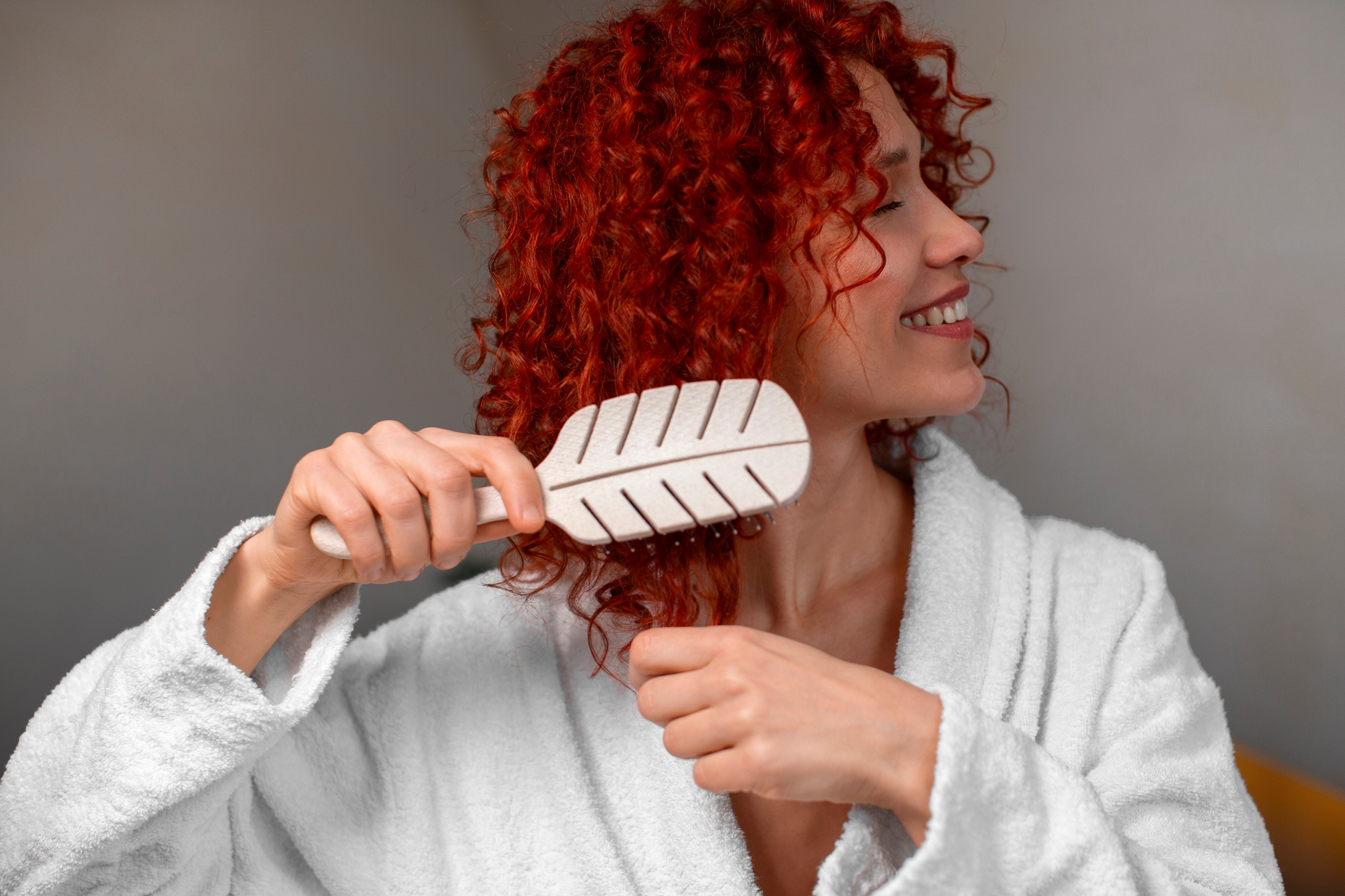 medium-shot-young-woman-with-curly-hair