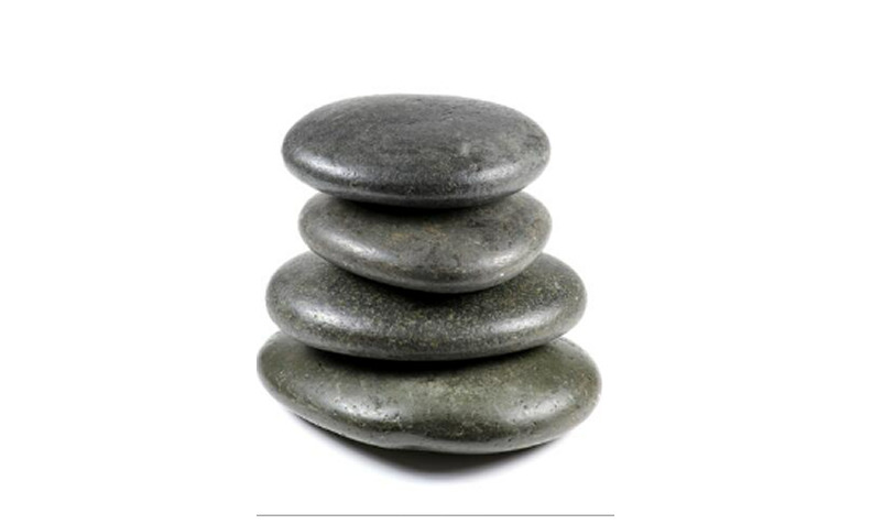 How are massage stones used?