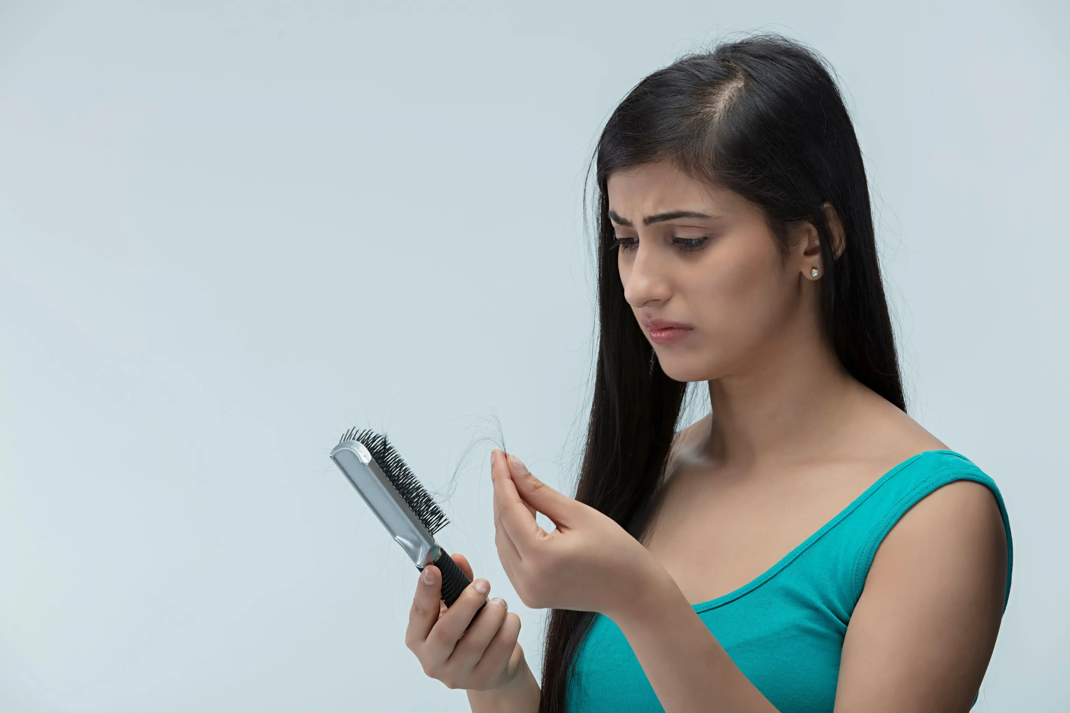 Hair Thinning: Early Signs, Hidden Causes & What You Should Do Next