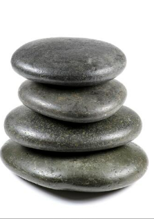 How are massage stones used?