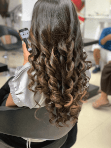 Woman With Curly Hair Style | Bodycraft
