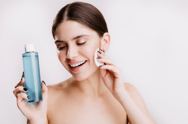 Applying facial toner