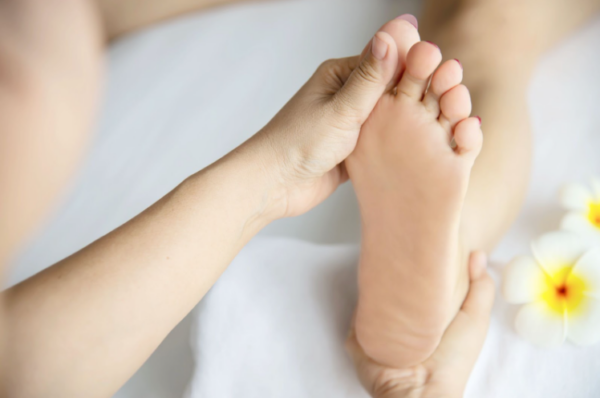 Foot massage for relaxation and therapy
