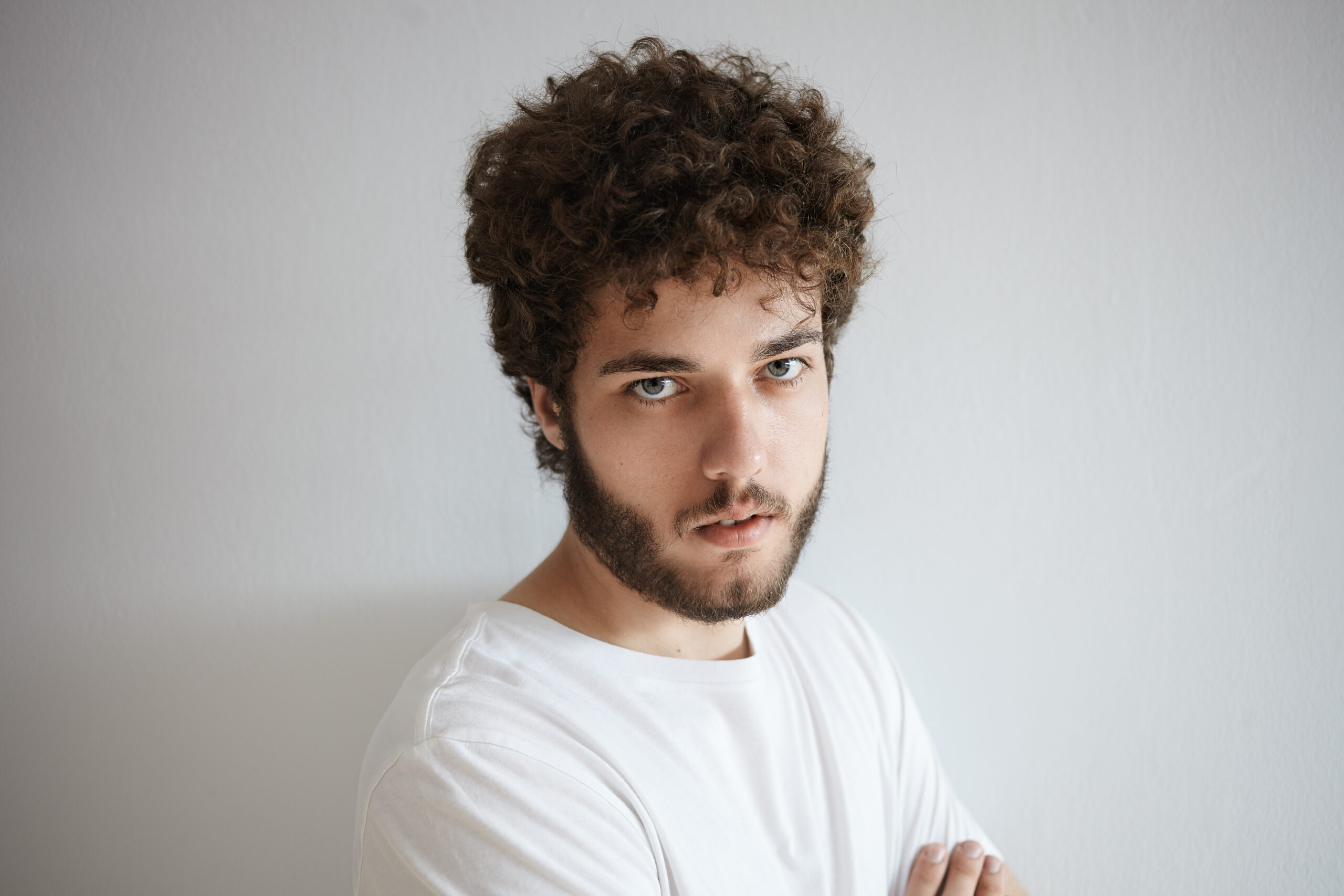 Short and Textured Haircut for Curly Guys